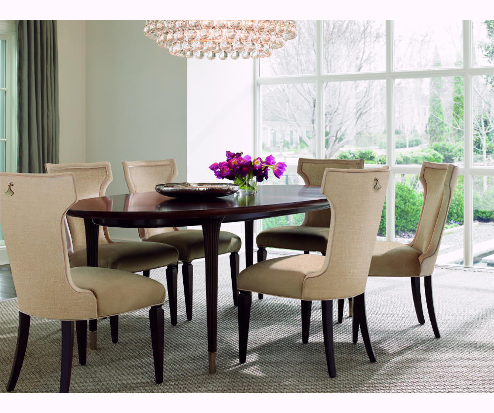  For a more sophisticated look for larger spaces, this grand Chatillon extension table from Decorium has a gorgeous finish and two 22" leaves for XL dinner parties. 