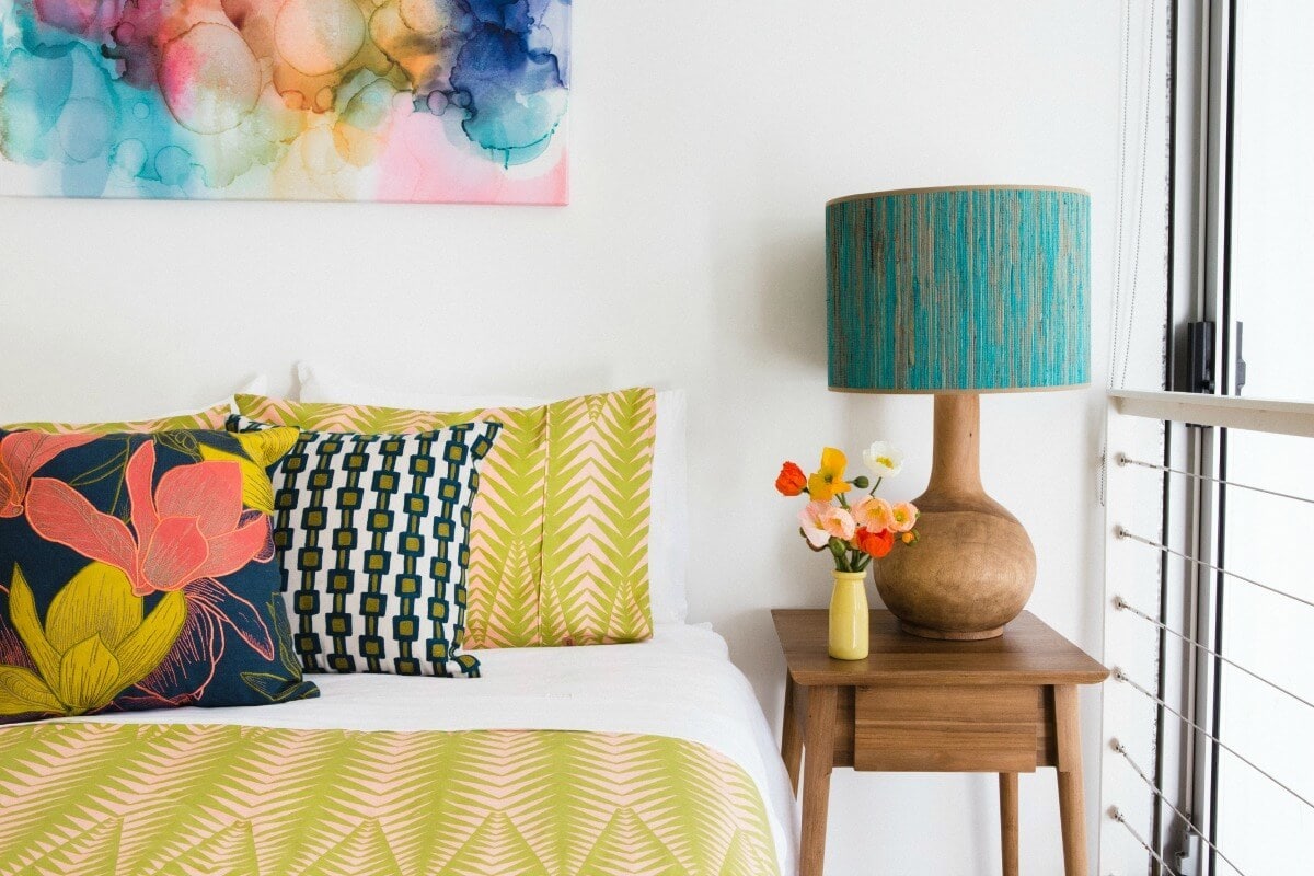 mustard-bedding-set-with-floral-bed-cushion-and-colourful-abstract-art-by-emma-blomfield.jpg
