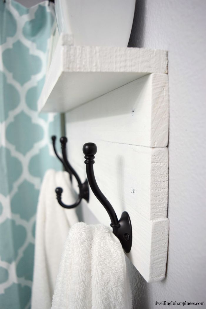 Add special hooks, possibly hung on a simple DIY like this one.