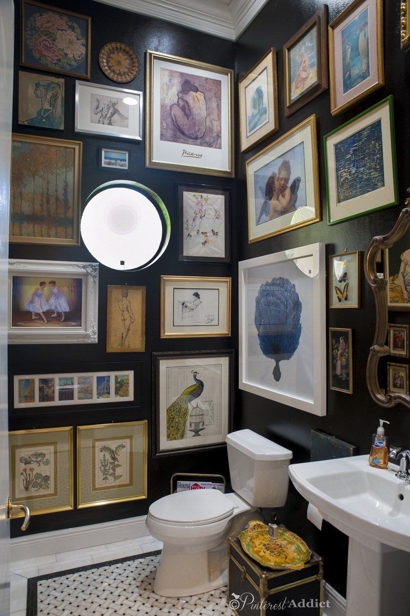 Hang oodles of art! It kind of looks nice with the dark walls too.