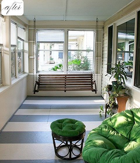 Add some paint to the floors! Painting stripes on a front porch sunroom is an easy way to add colour and fun.