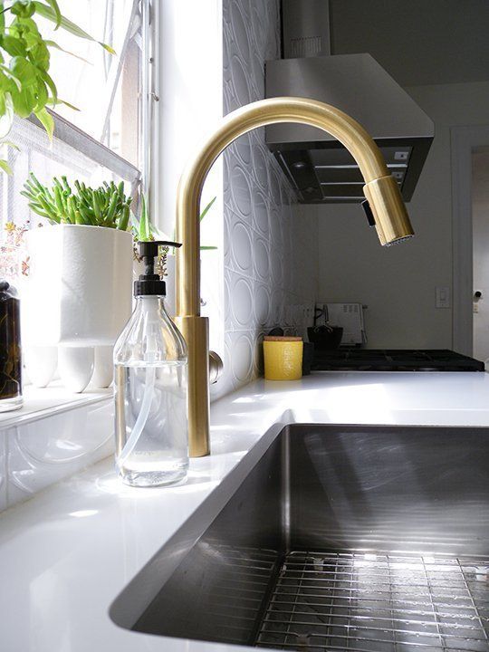 Gold faucets and hardware keeps popping up as the 'it' metal.