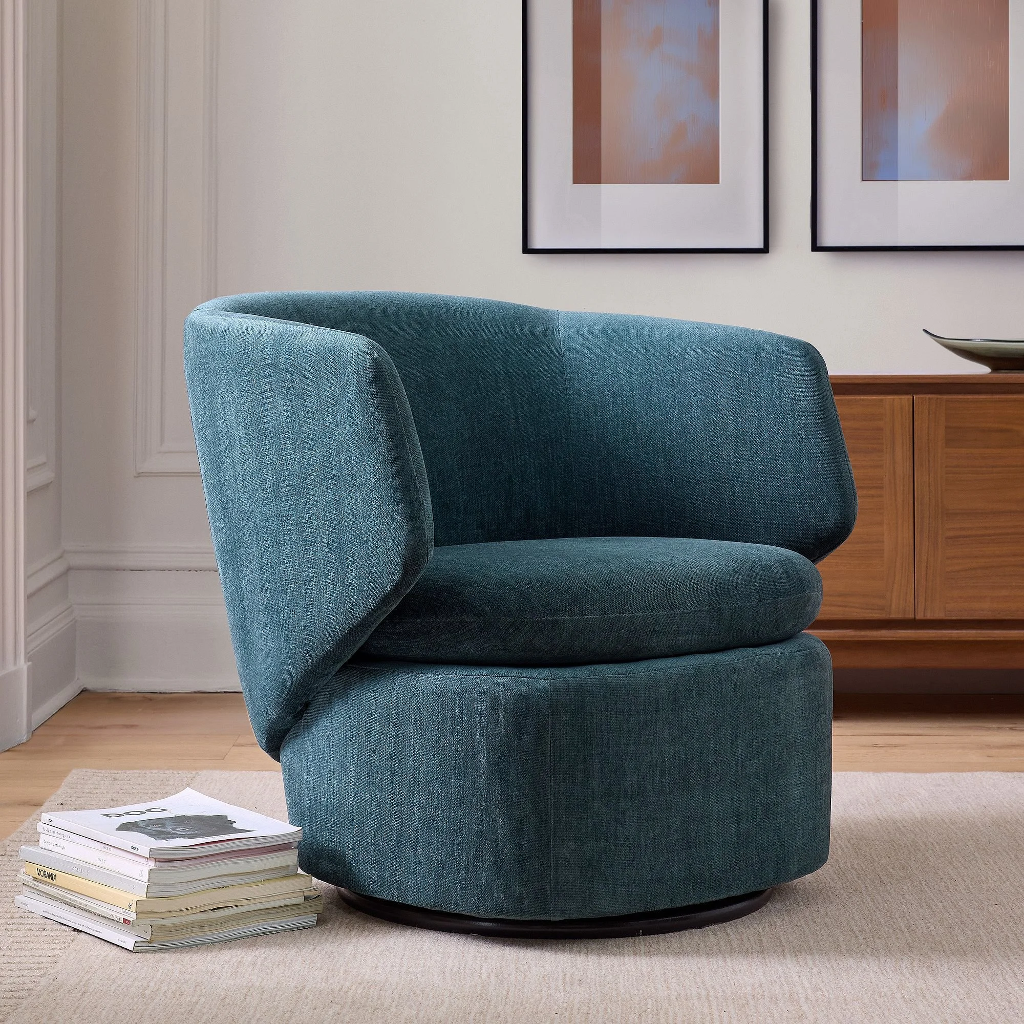 At West Elm, this swivel chair has a small footprint and is oh so comfy.