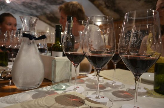 A flight of organic wines await you in the heart of Tuscany.