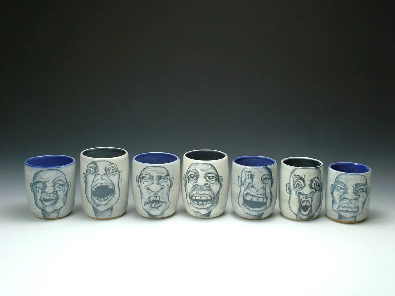 Allison Berniker, "Mugged", wheel thrown stoneware, 3.5x3.5x5" each, Ceramics II - Wheel throwing