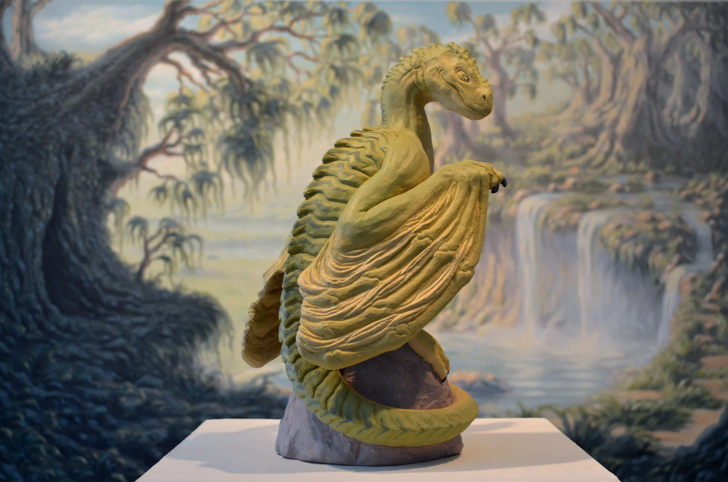 Eben Schumacher, "Venatorus Volatilis" - hand built stoneware with acrylic paint 10x10x14 inches, and "Fertile Cliffs"- oil painting, 36x48 inches, BA exhibition, 2016