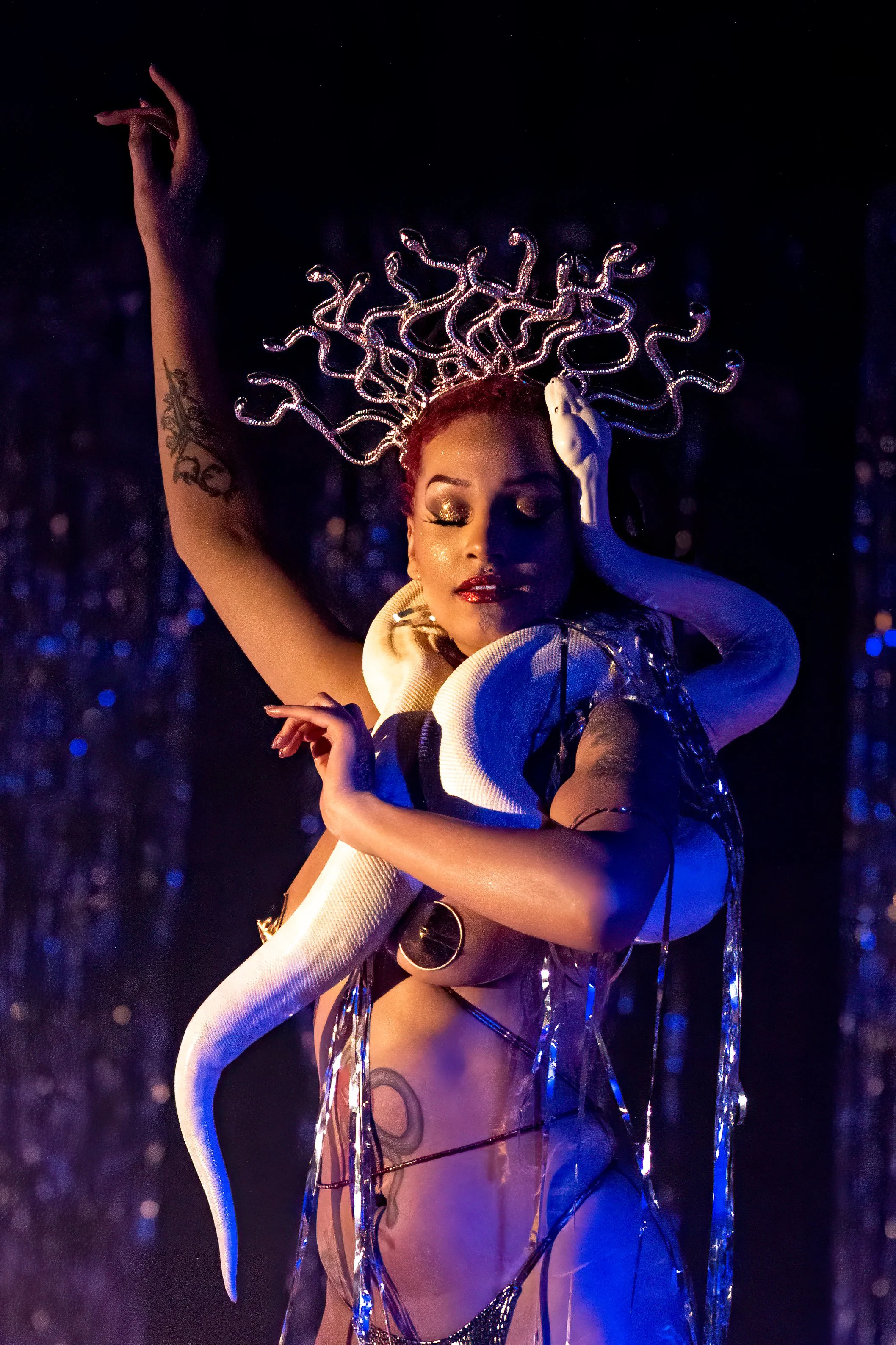 woman dances with snake
