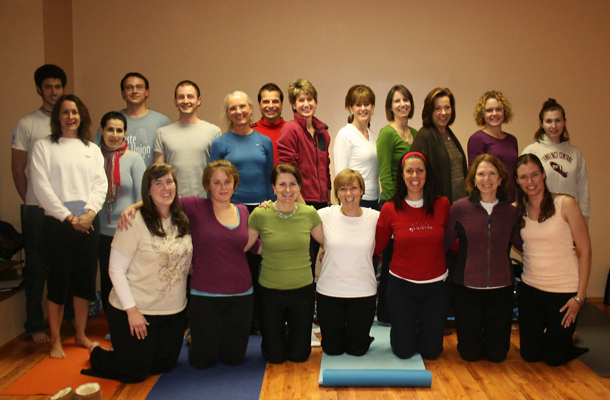 Our amazing Cityoga Yoga Teacher Training Class. That's me in the peach tank on the end.