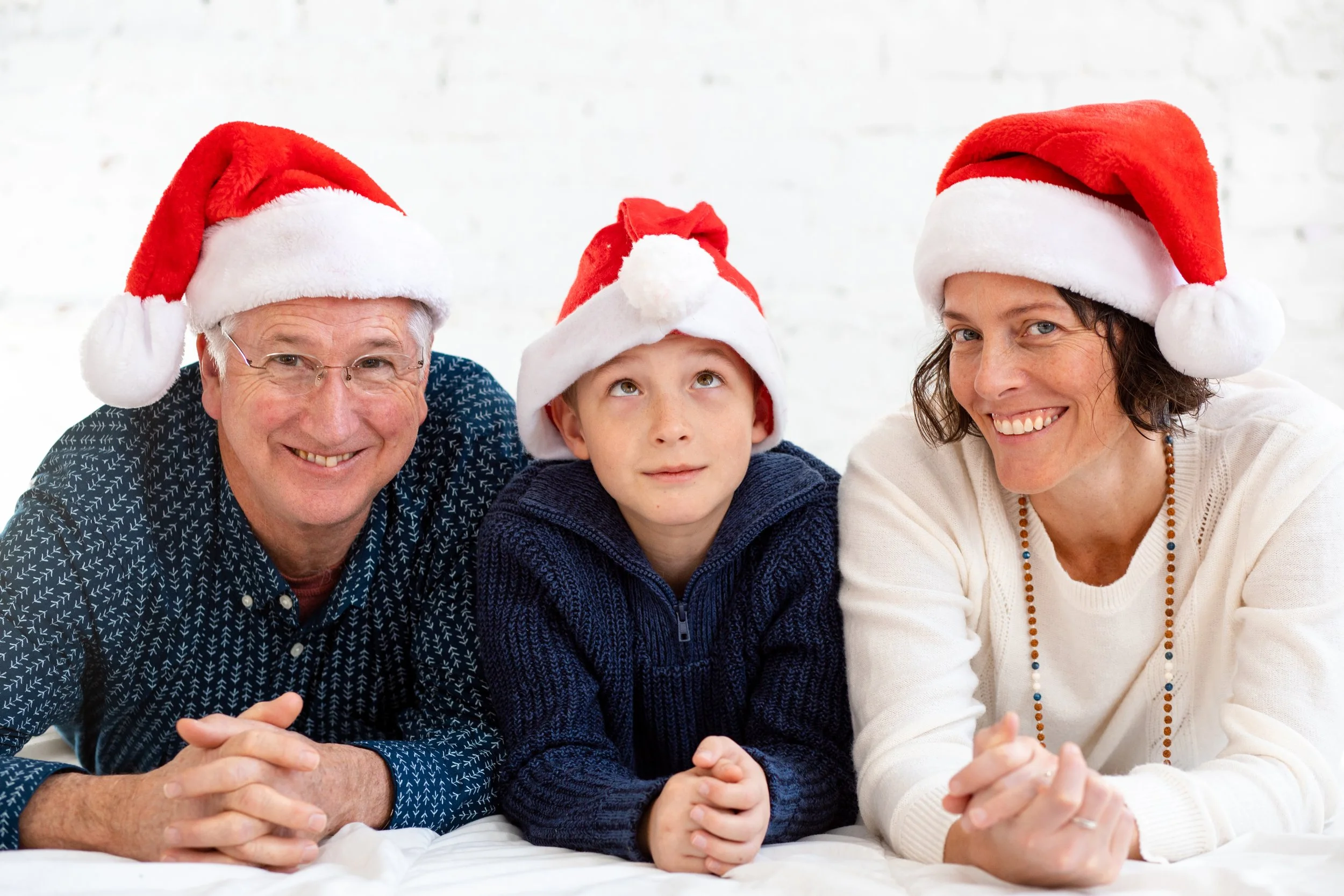 family in santa hats