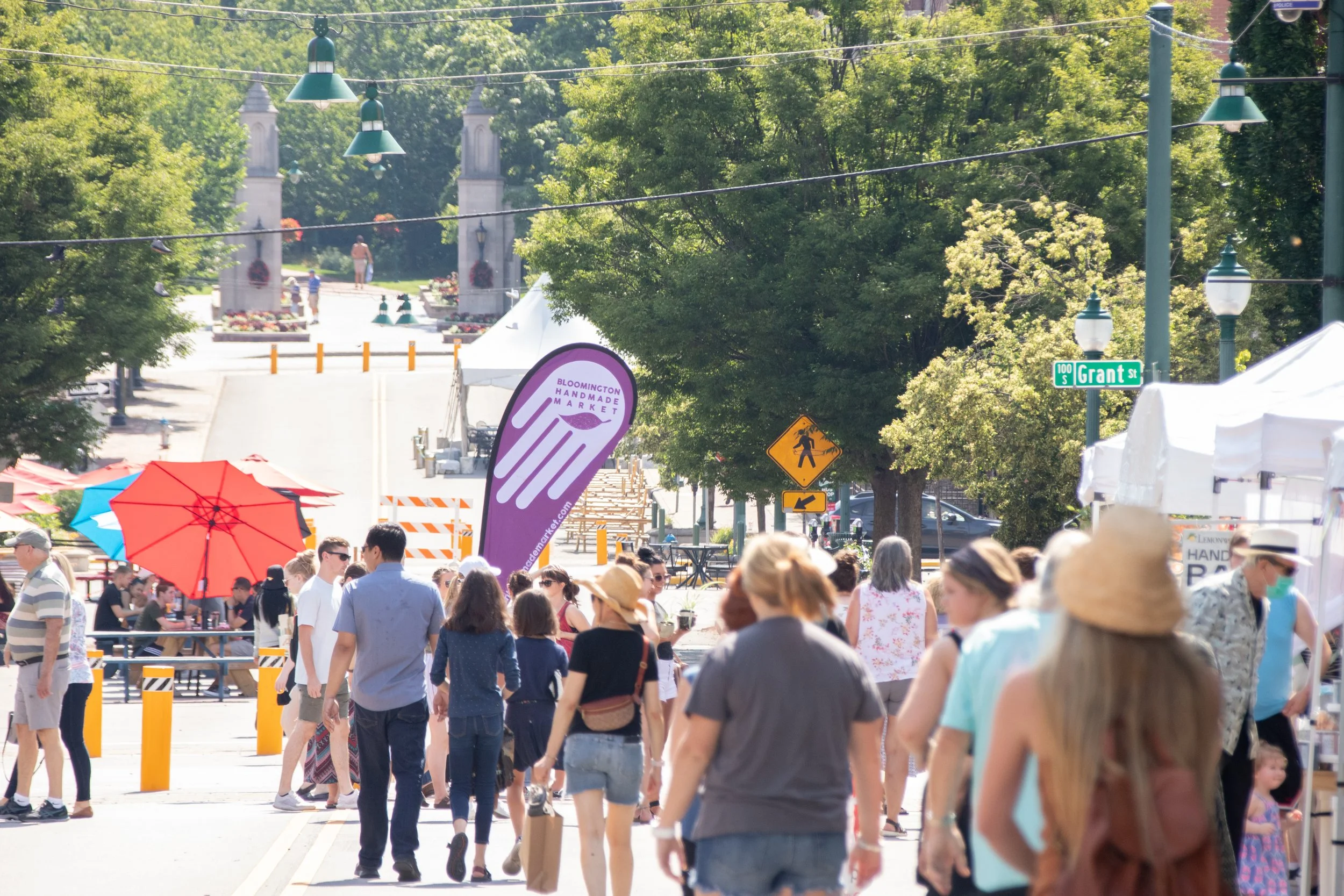 crowd gathered at outdoor market by indiana university sample gates