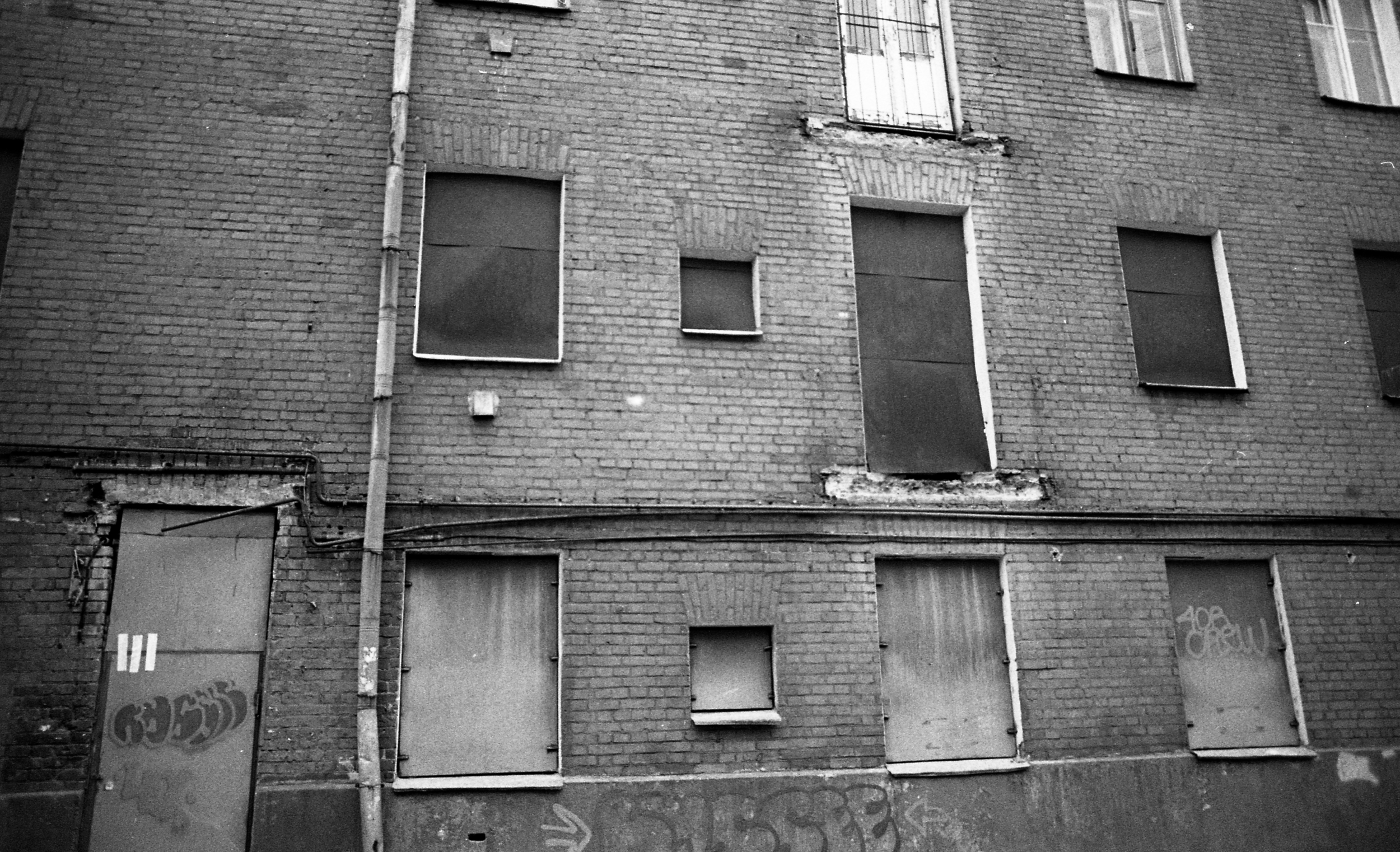 From left: Kitchen window, bathroom window, our neighbor/friend's balcony that was taken down because of the high amount of break ins. 
