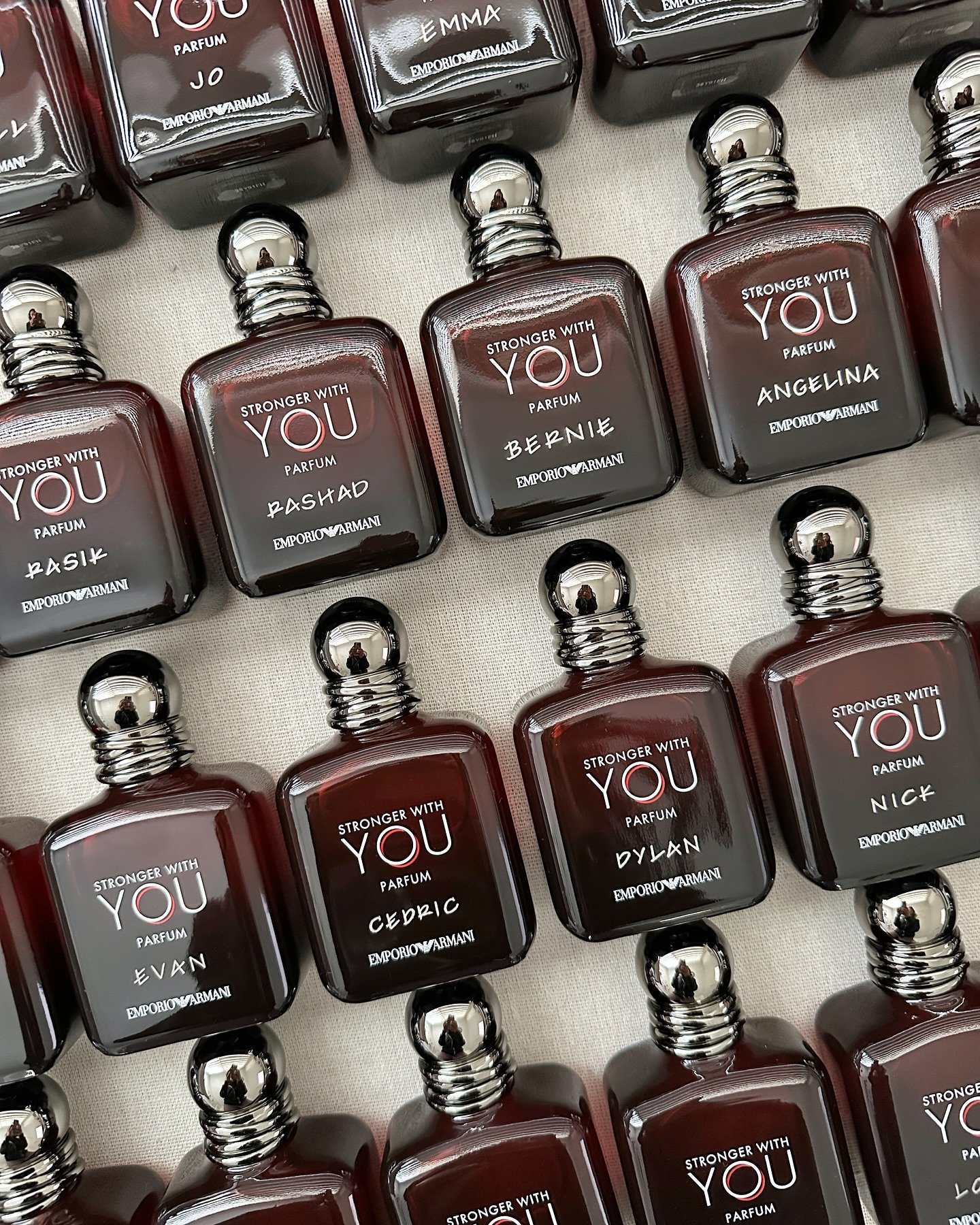 Elevated place cards. Let&rsquo;s think out of the box and transition from standard  paper place cards to products that double as gifts. Here are fragrance place cards for @armanibeauty , each hand engraved in a contemporary lettering style to add a 