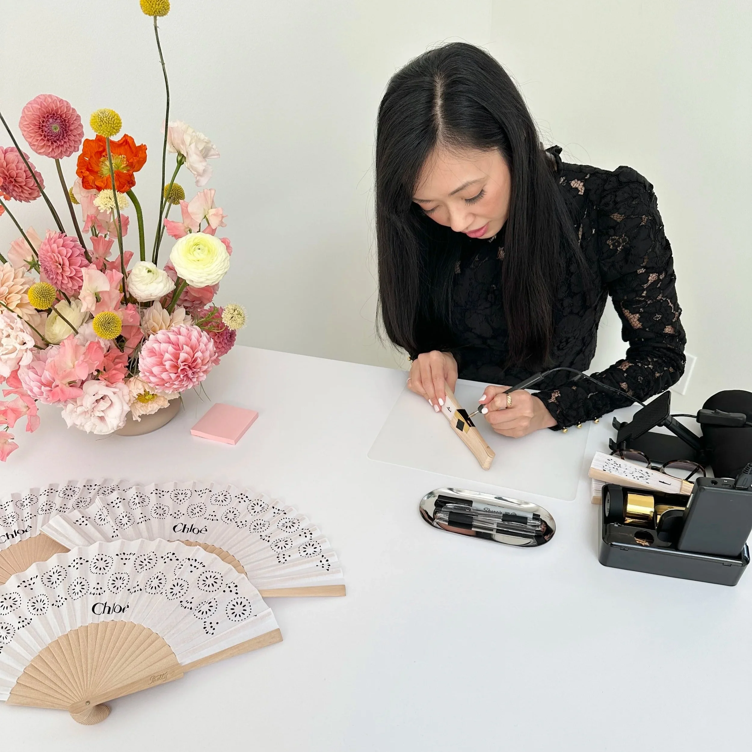  Betty Ling Calligraphy personalized Chloe handheld bamboo fans for a VIP event at their Melrose boutique in Los Angeles.  