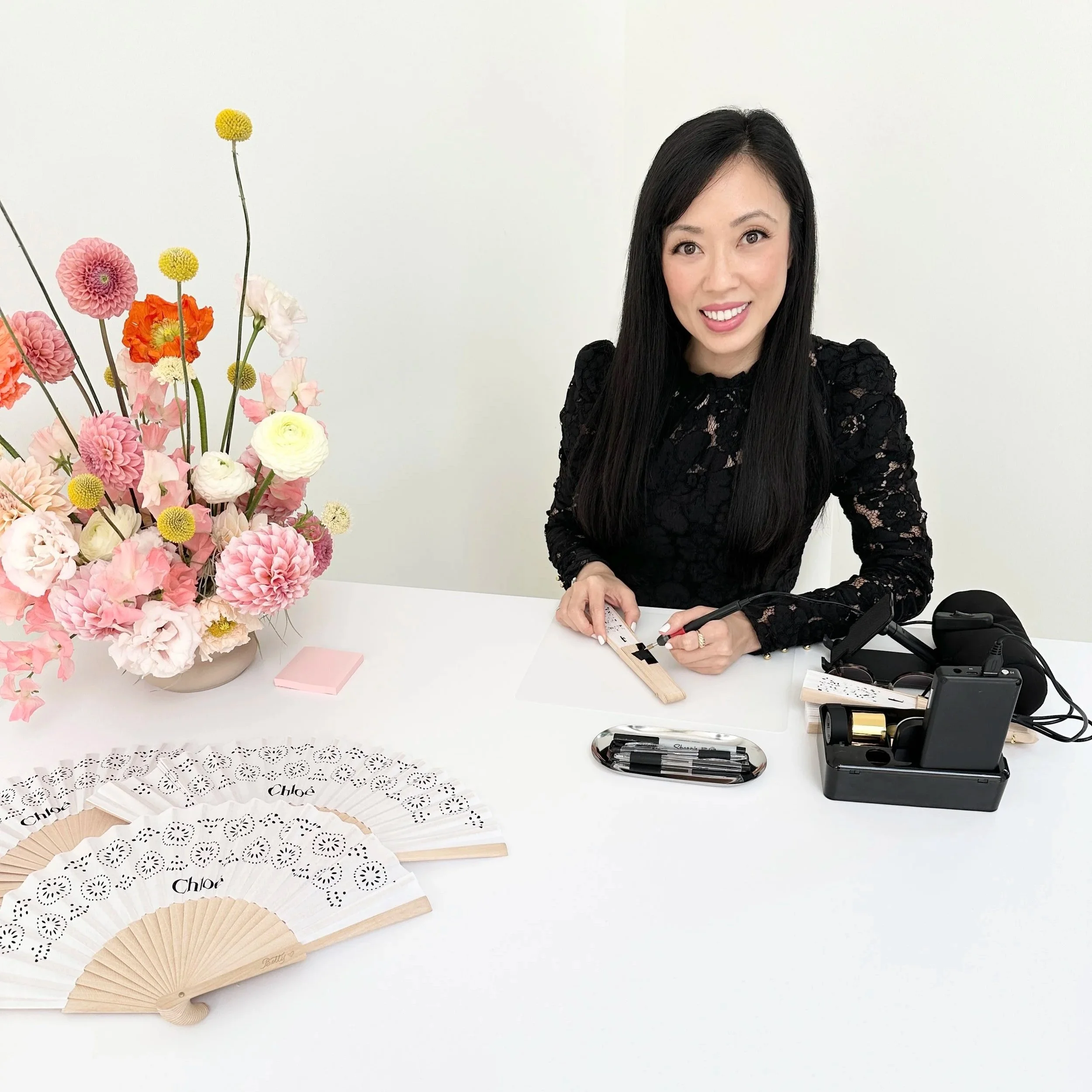  Betty Ling Calligraphy personalized Chloe handheld bamboo fans for a VIP event at their Melrose boutique in Los Angeles.  