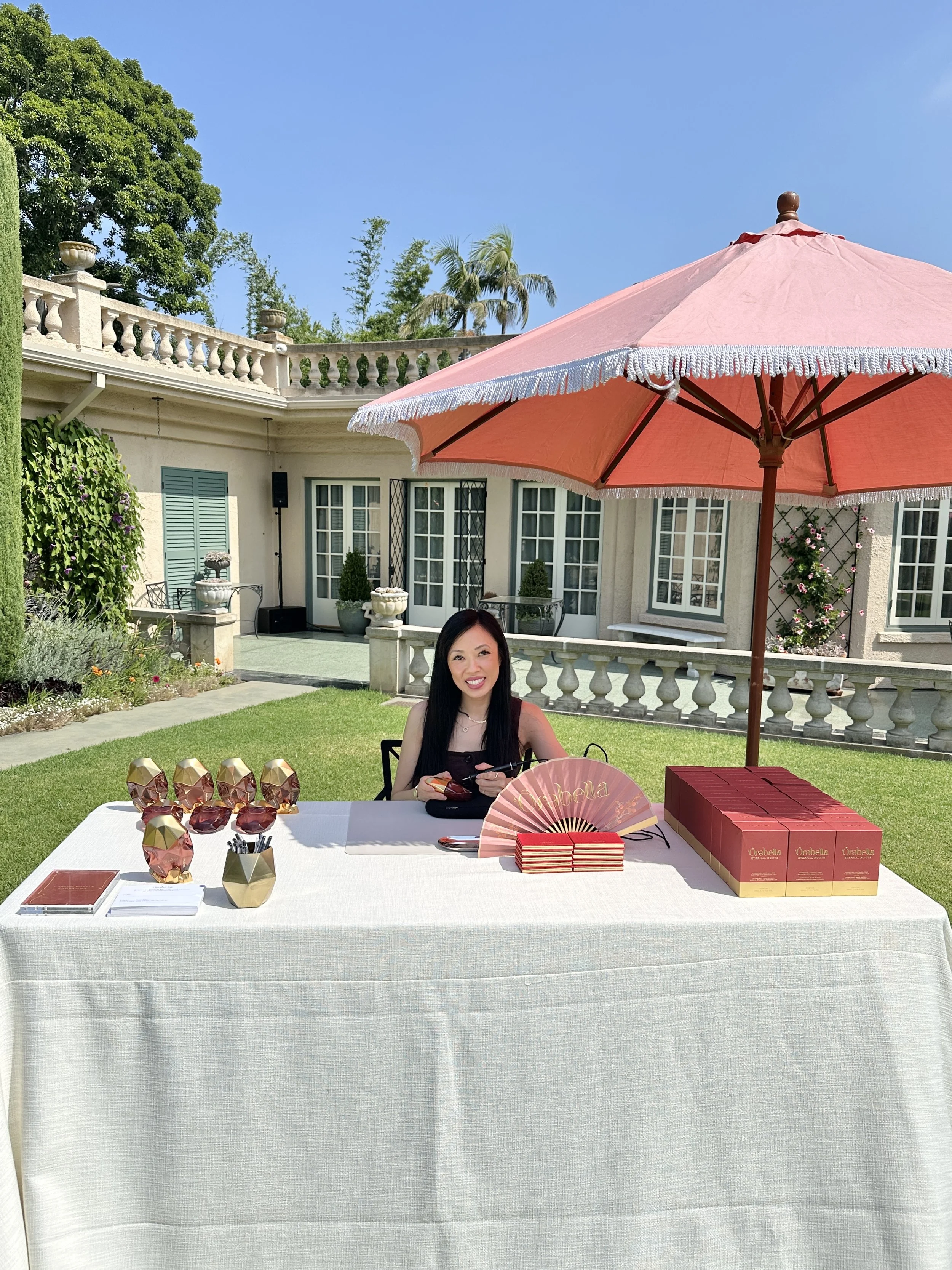  Betty Ling Calligraphy engraved perfume bottles for Orebella fragrances in Beverly Hills with guest names, filled with gold to match the brand’s logo. 