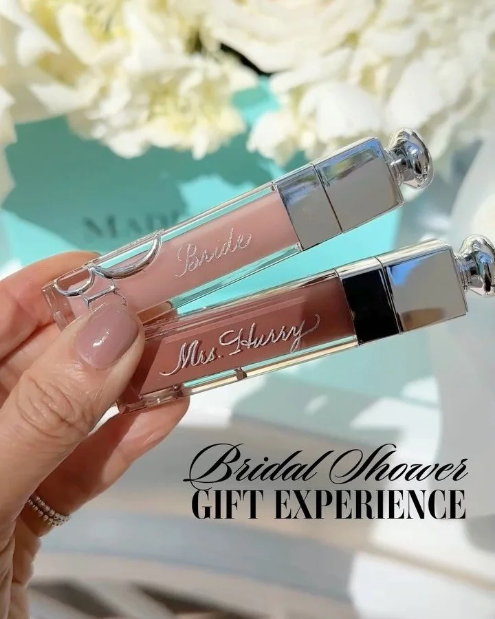 Elevate your bridal shower with a bespoke gifting experience. 💋

Guests selected their favorite lip gloss shade. Then each lip gloss was engraved with their name for a personal touch. Finished with a custom gift bag&mdash;because every detail matter