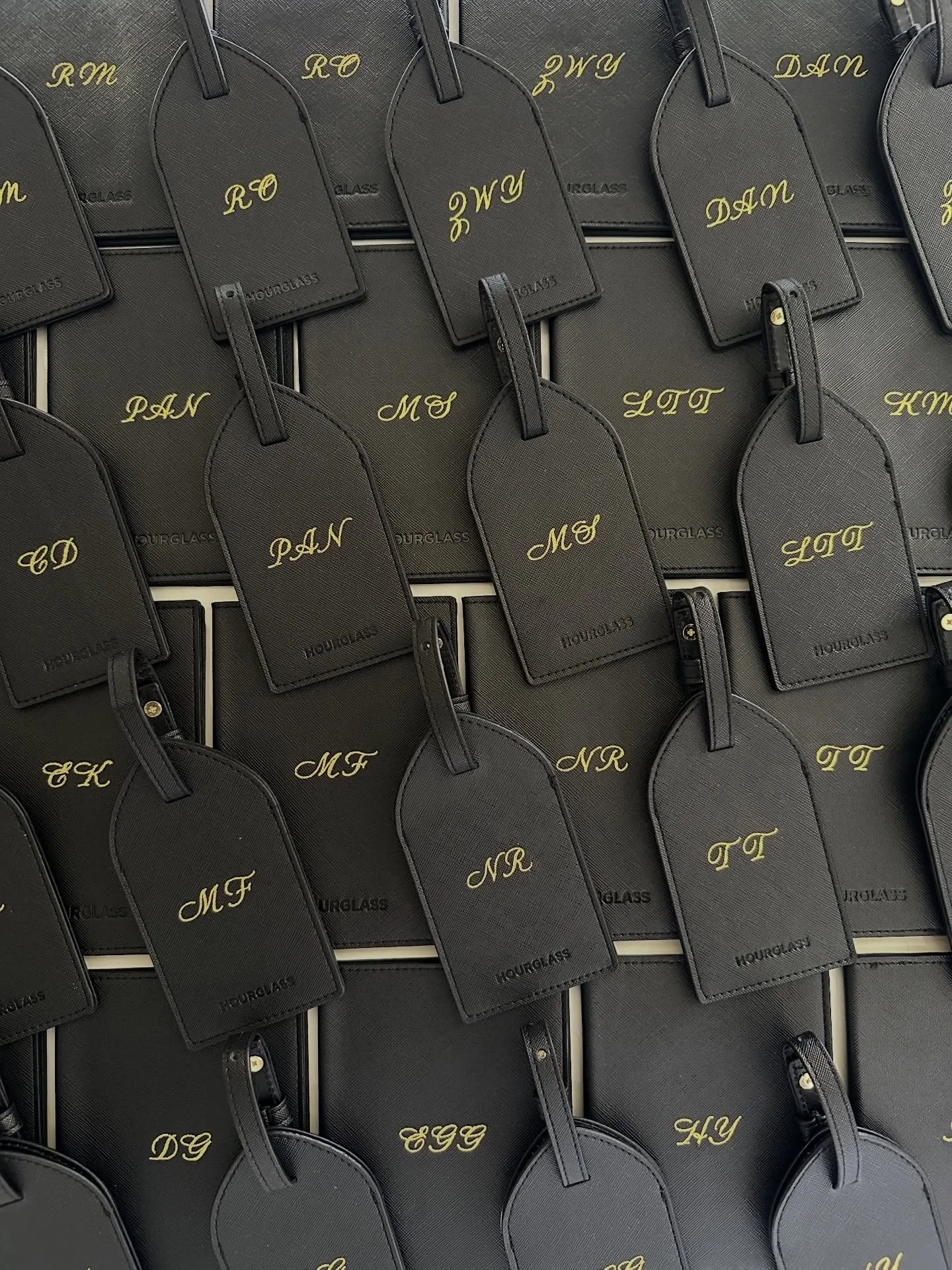 Matching set: passport holders and luggage tags for a destination trip for Hourglass. Each set was hand created with hot foil calligraphy.

#losangelescalligrapher #losangelesengraver #personalizedgifts #brandactivation