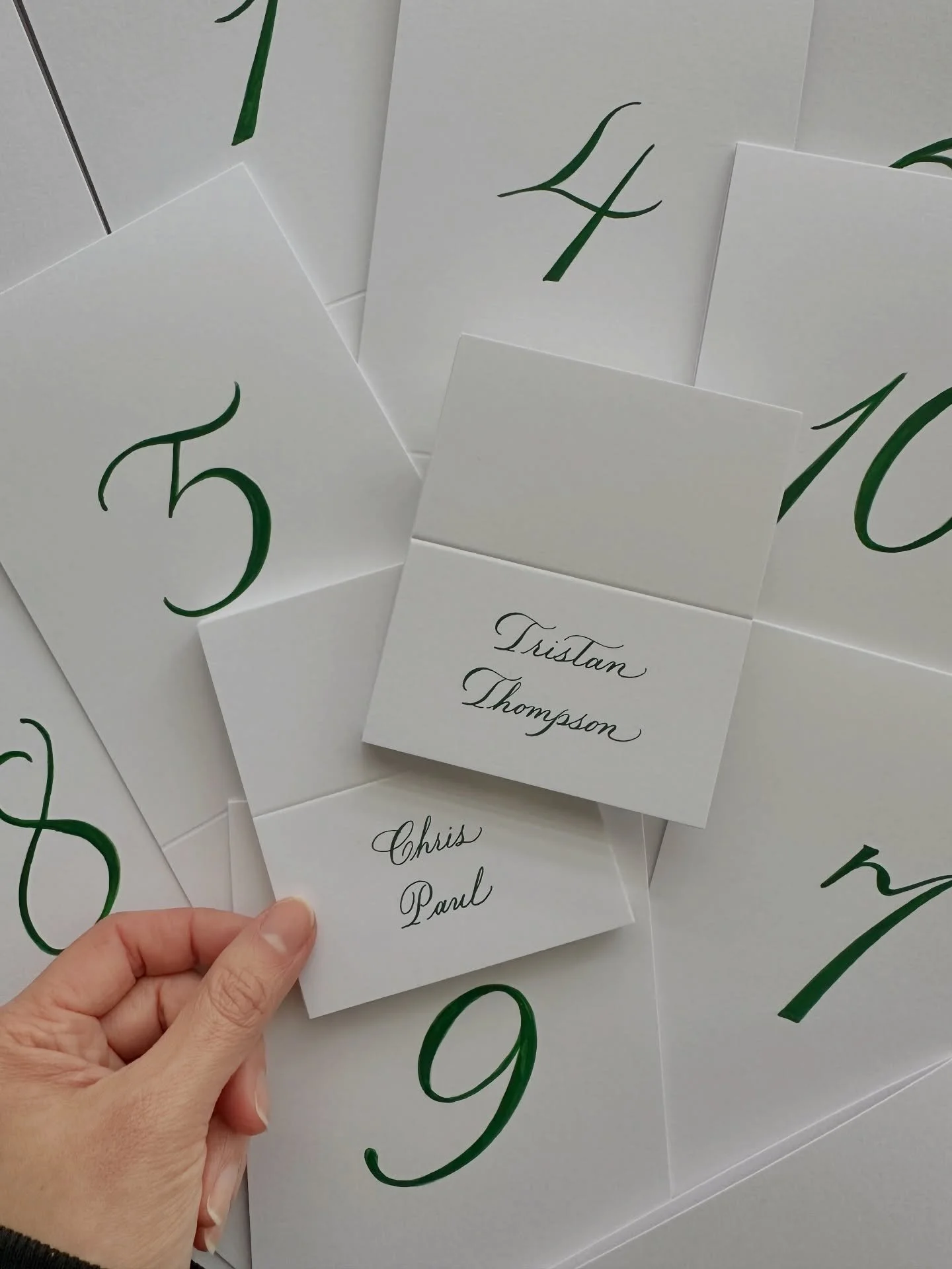 My husband checks the spelling on all my place cards, and he always points out the basketball players. 🏀

Elevate your tablescape with hand calligraphed place cards and hand painted table numbers. 

#placecards #losangelescalligrapher #Personalizati