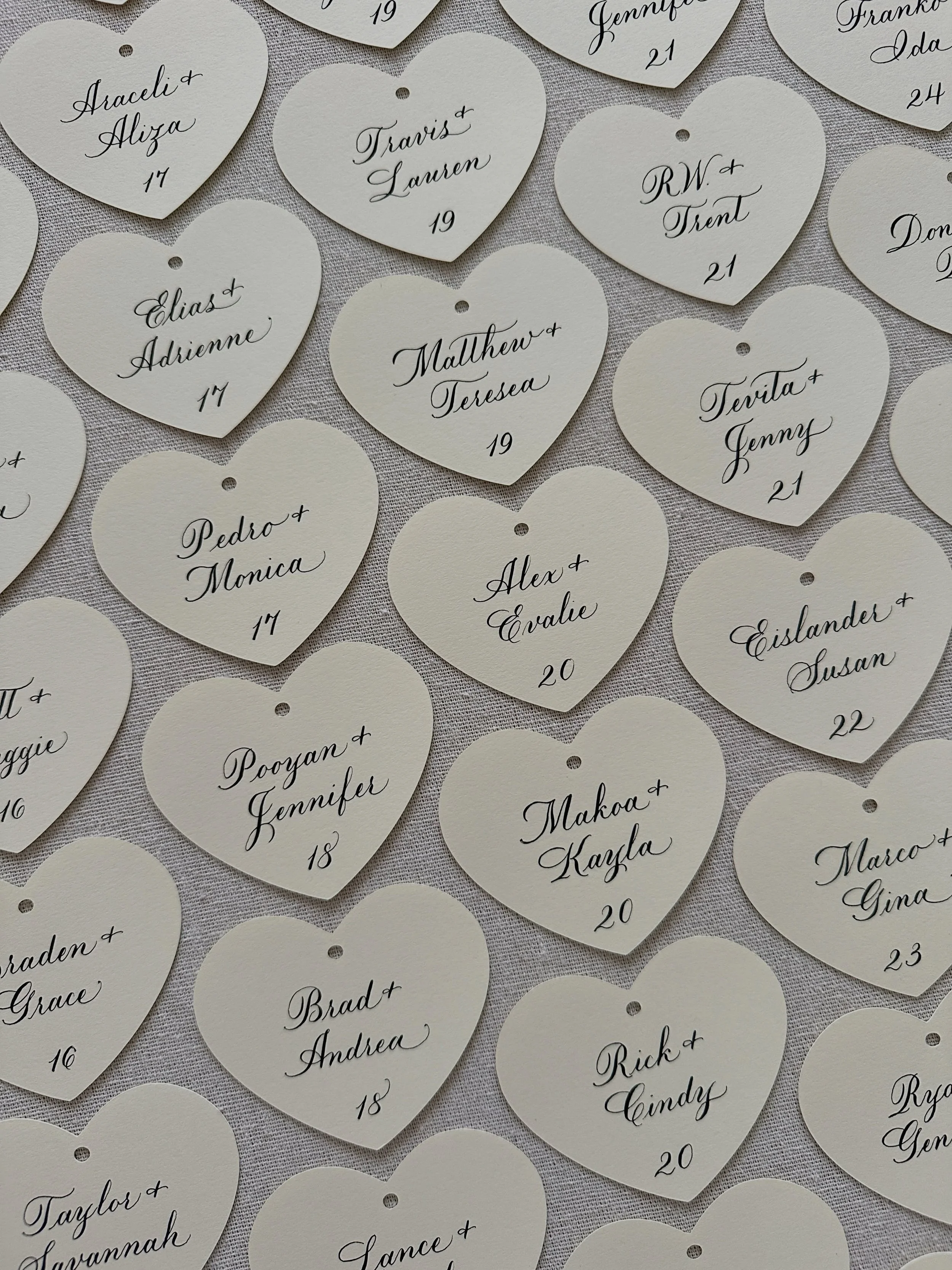 Custom die cut heart place cards for a wedding table seating display. ❤️&hearts;️❤️

#losangelescalligrapher #placecards