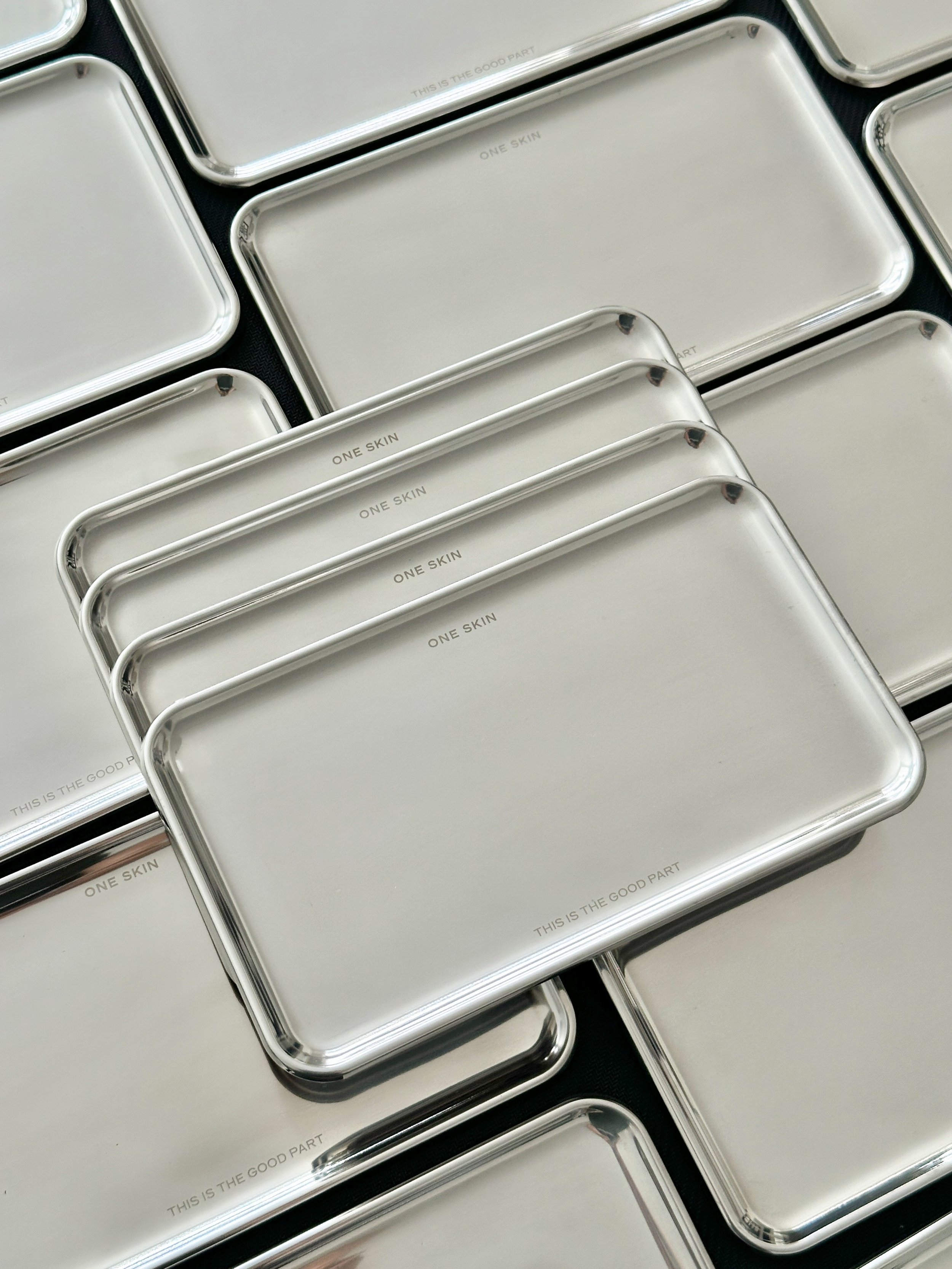 Laser engraved stainless steel trays for @oneskin.co 

#losangelescalligrapher #losangelesengraver
