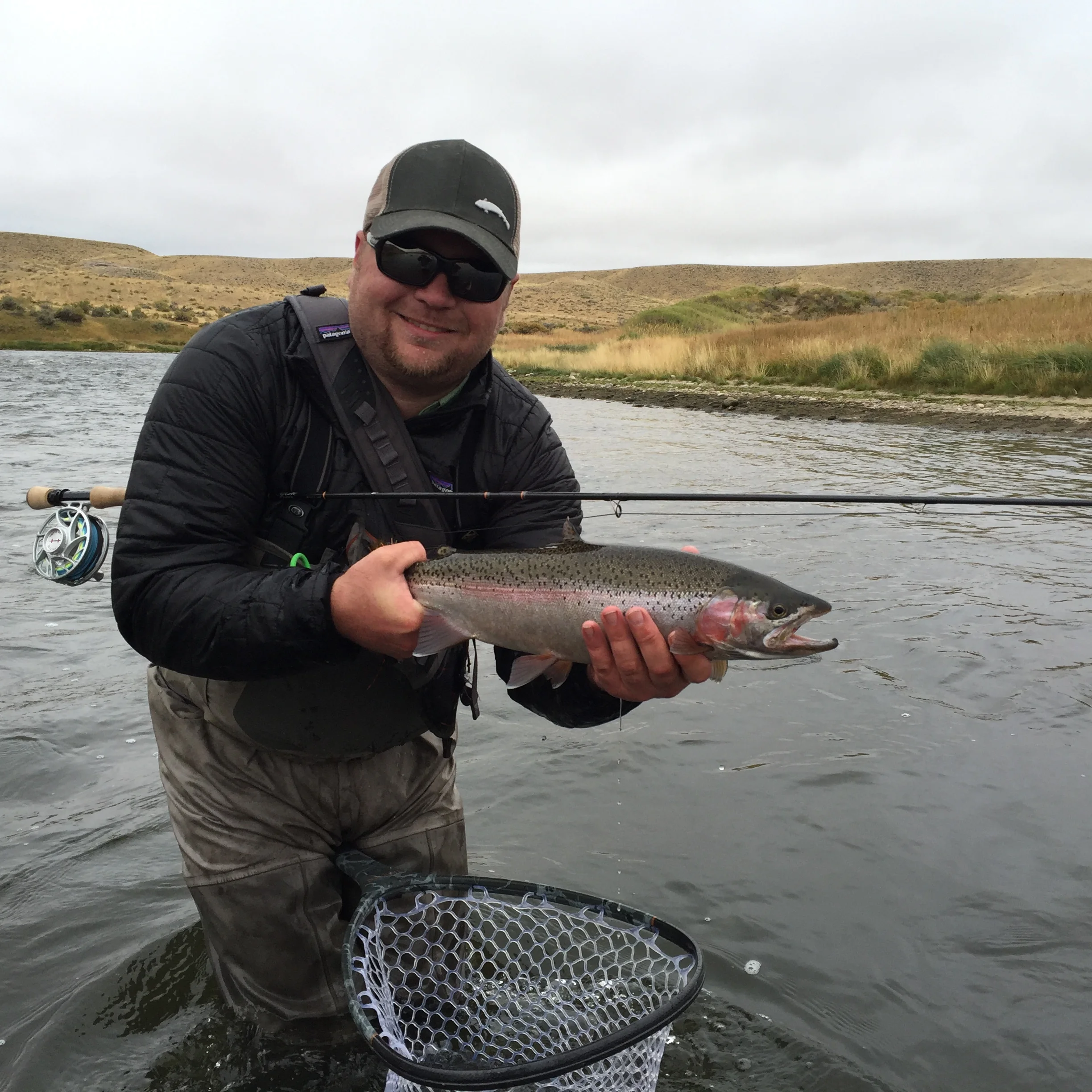 Chris holding the results of his fly tying skills