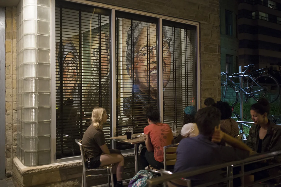 View of exhibition from patio of Cass Cafe