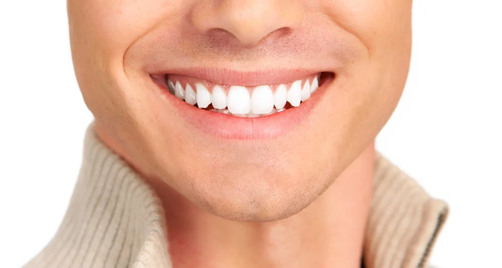 shutterstock-man-smile-closeup-white-teeth.jpg