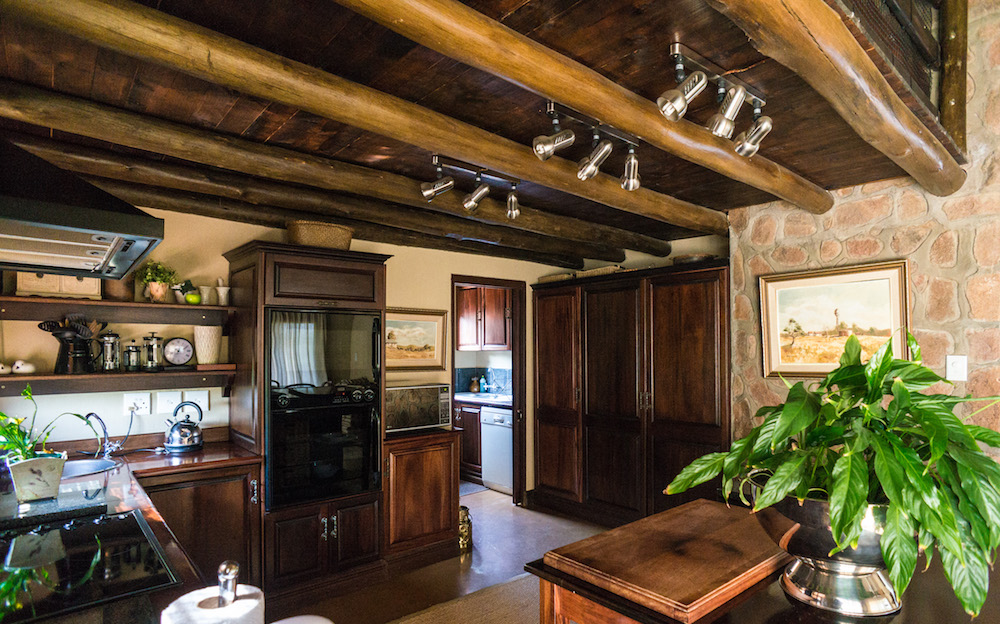 Kitchen with enclosed fridge