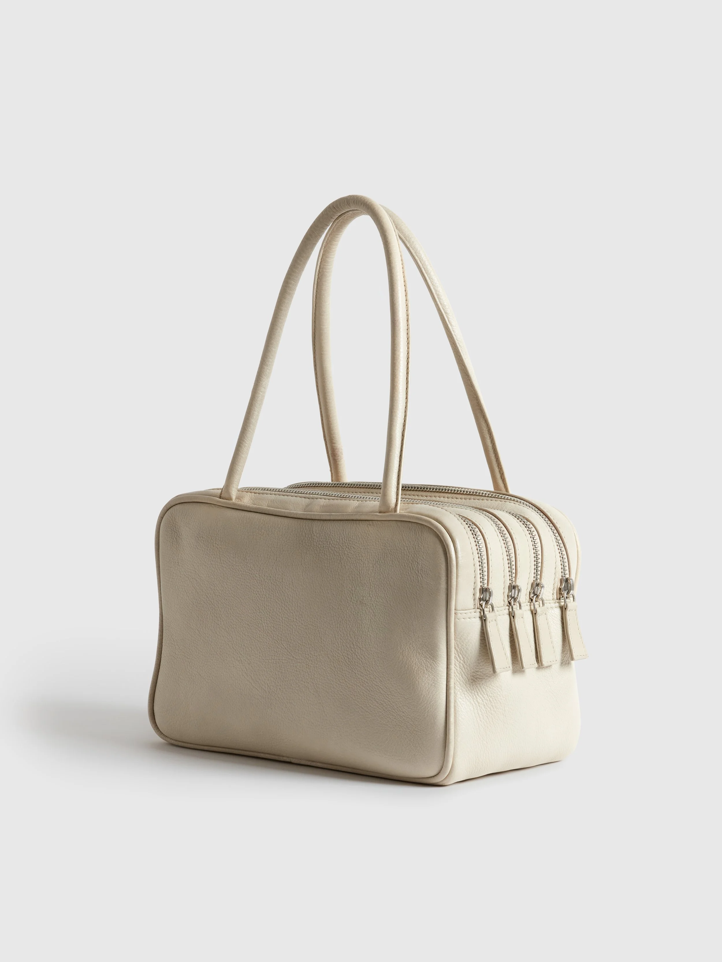 Estella_Off-White_Side.jpg