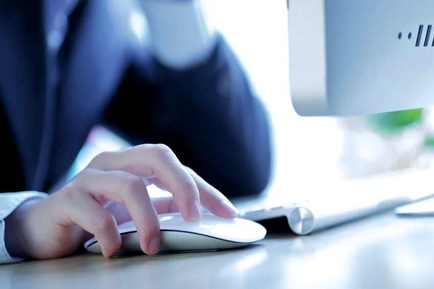 businesswoman using desktop computer.jpg