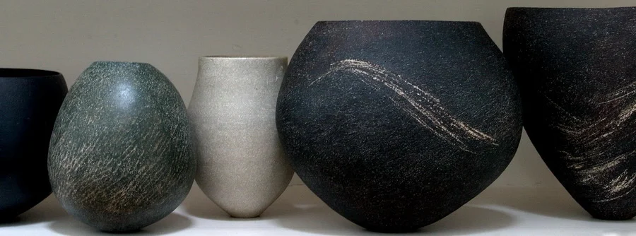 My pots made of stoneware, sometimes with an admixture of porcelain together with oxides and stains are all hand built, using traditional coil building methods. The rhythm and patience needed to produce good forms I find ideally suited to my way of work. I recently moved studios to Art House, Grafton Quarter where there is a purpose built collection of over 100 artists studios, run by the Artist Studio Company, a charitable trust providing affordable space for artists and creators. Online sales are held roughly four times a year through this website, with usually about thirty pots for sale. If you would like to be informed of imminent sales, you can elect to do so via the sign up form on my contact page. This is also used to collate invitations to my annual Open House event, which is a good opportunity to view current and new work. Of course if you would like to inquire about work outside of these times, please feel free to do so via my contact page.
