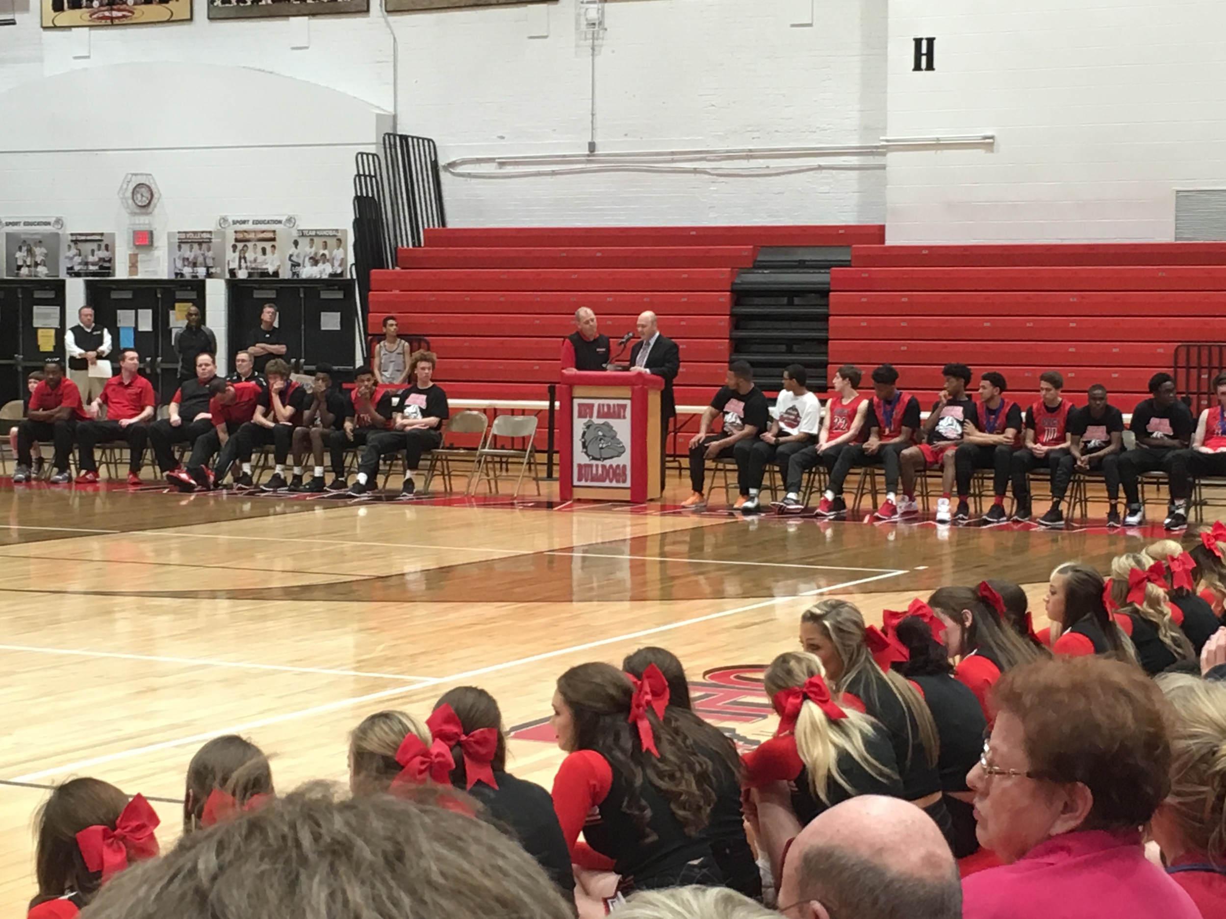 Mayor Gahan presents Coach Shannon with a proclamation naming April 4th "New Albany Bulldog Week."