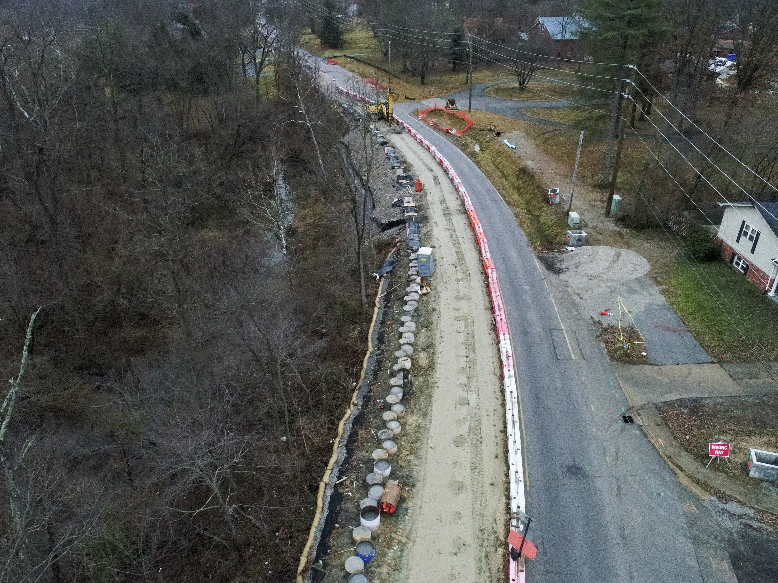 20 foot long (or longer) drilled shafts being installed into the hillside to help stabilize mt tabor road.