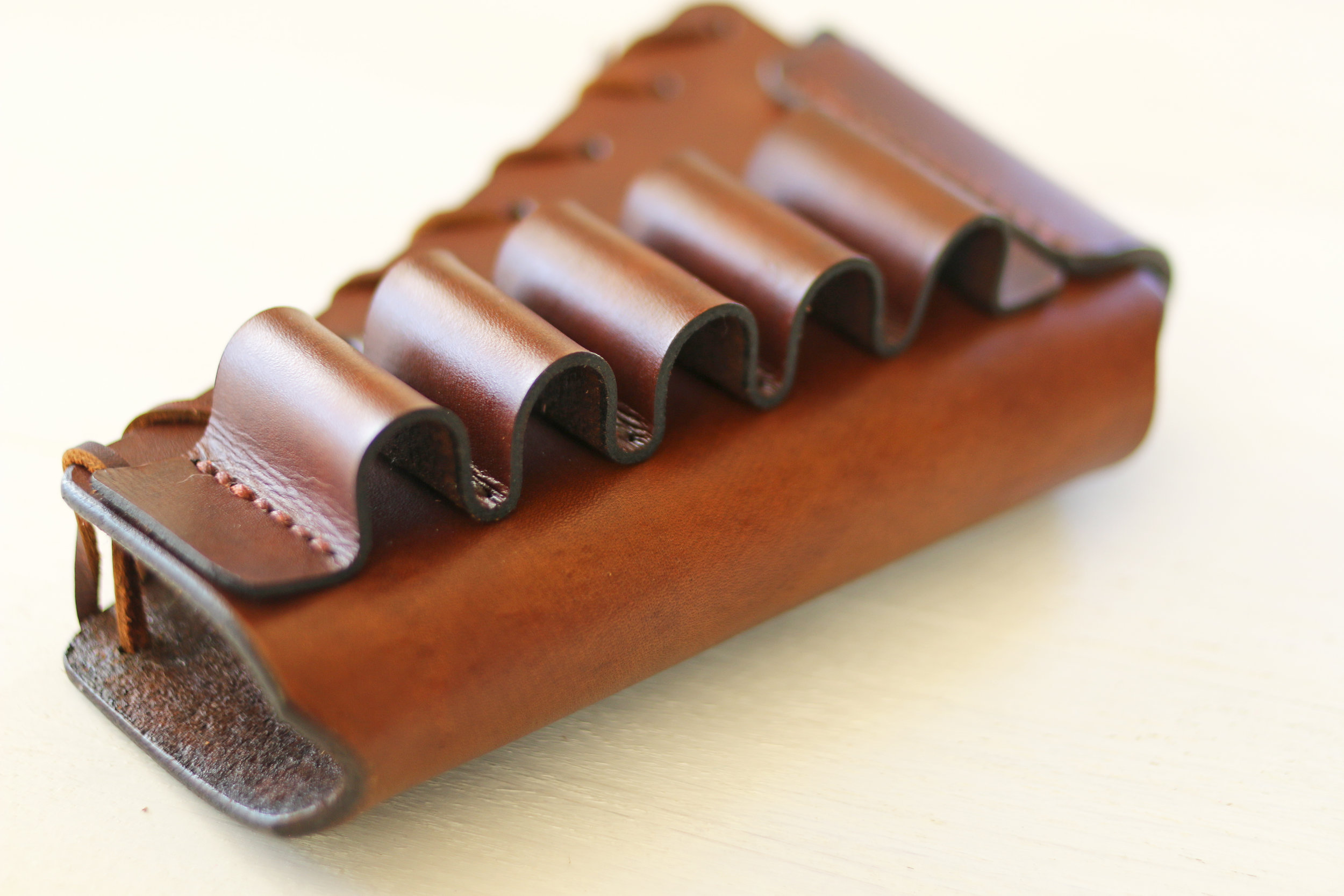 top front angle of bullet loops medium brown.jpg