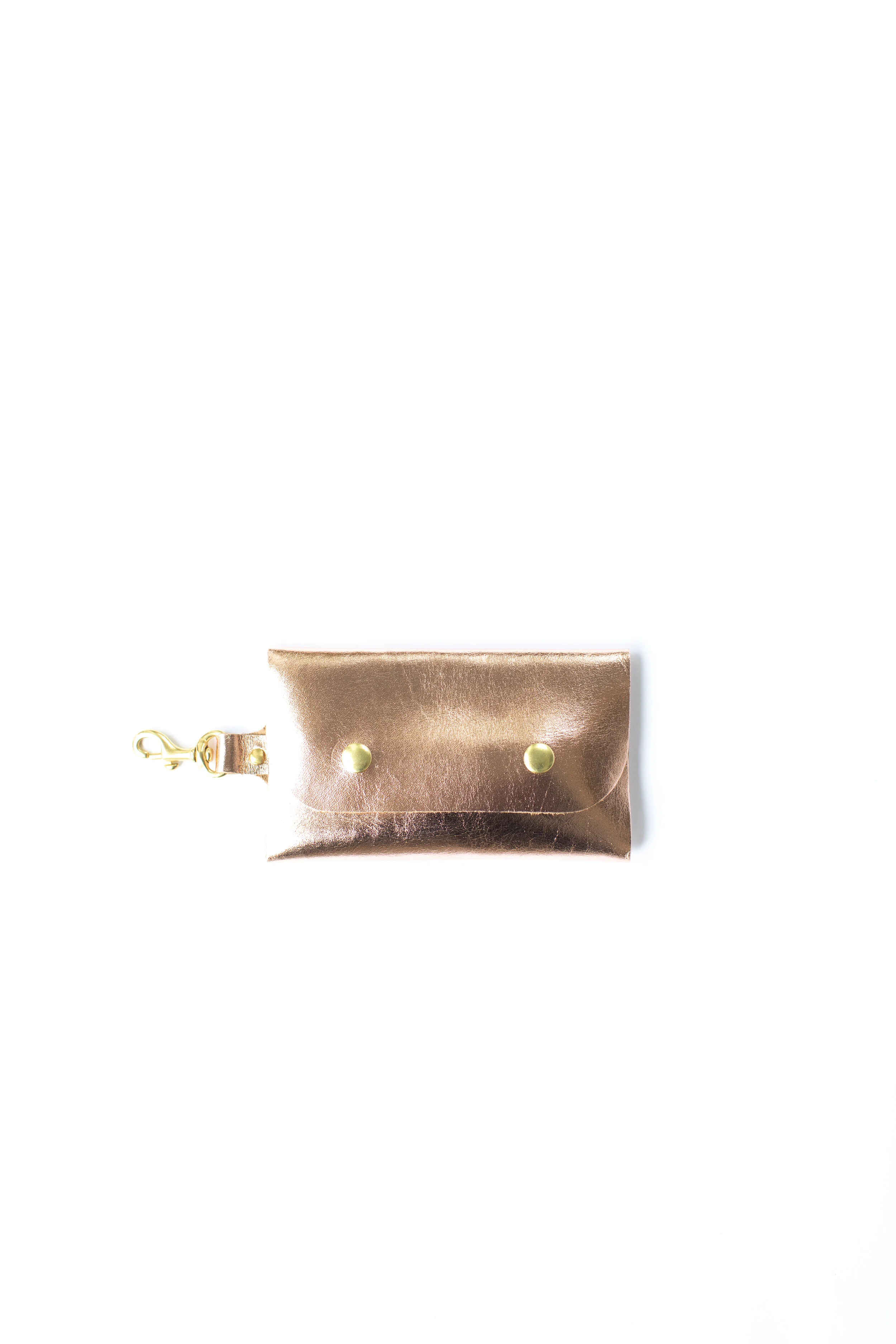 portrait rose gold closed front flat lay.jpg