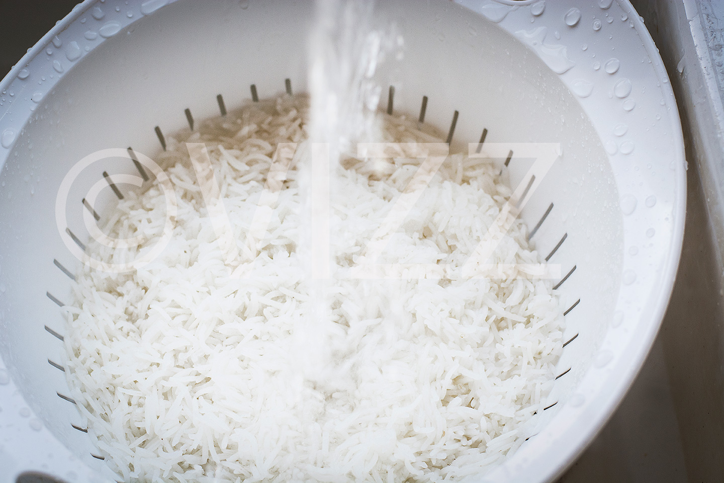 Rinse rice under cold water