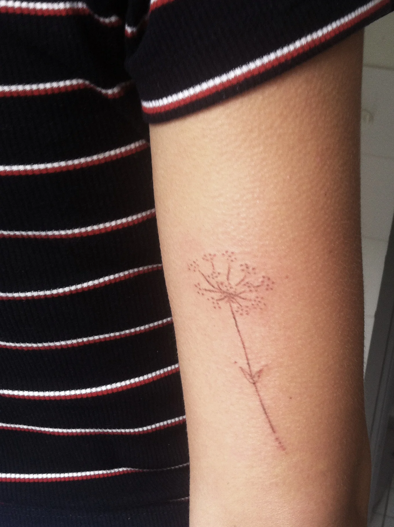 handpoke tattoo brown