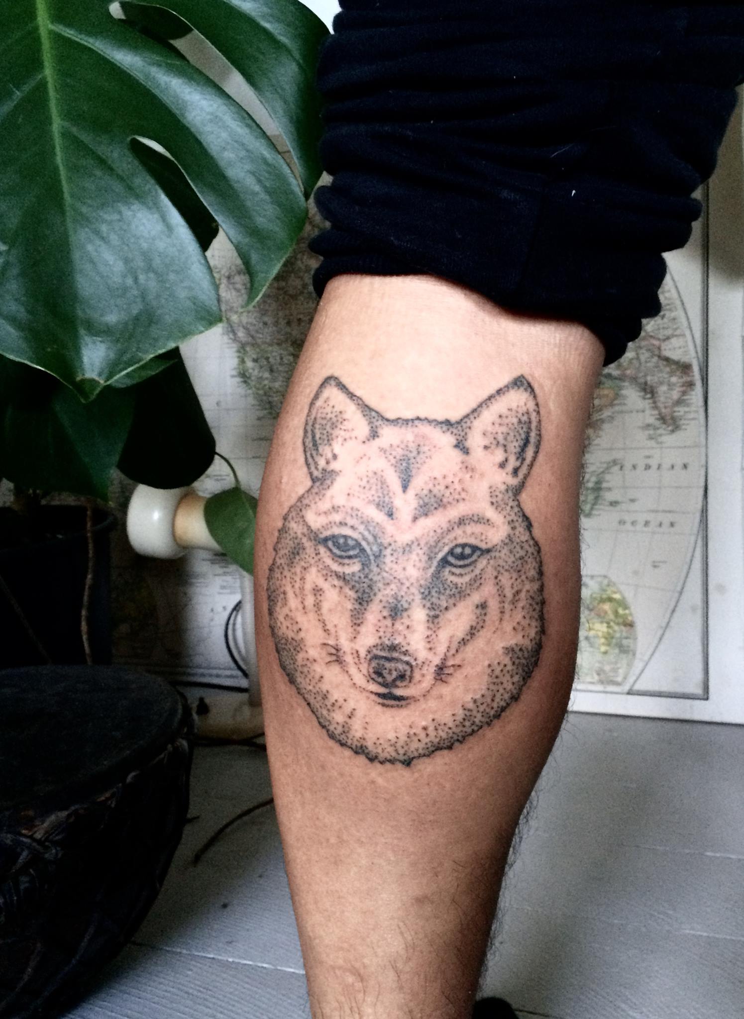 wolf. hand poked tattoo