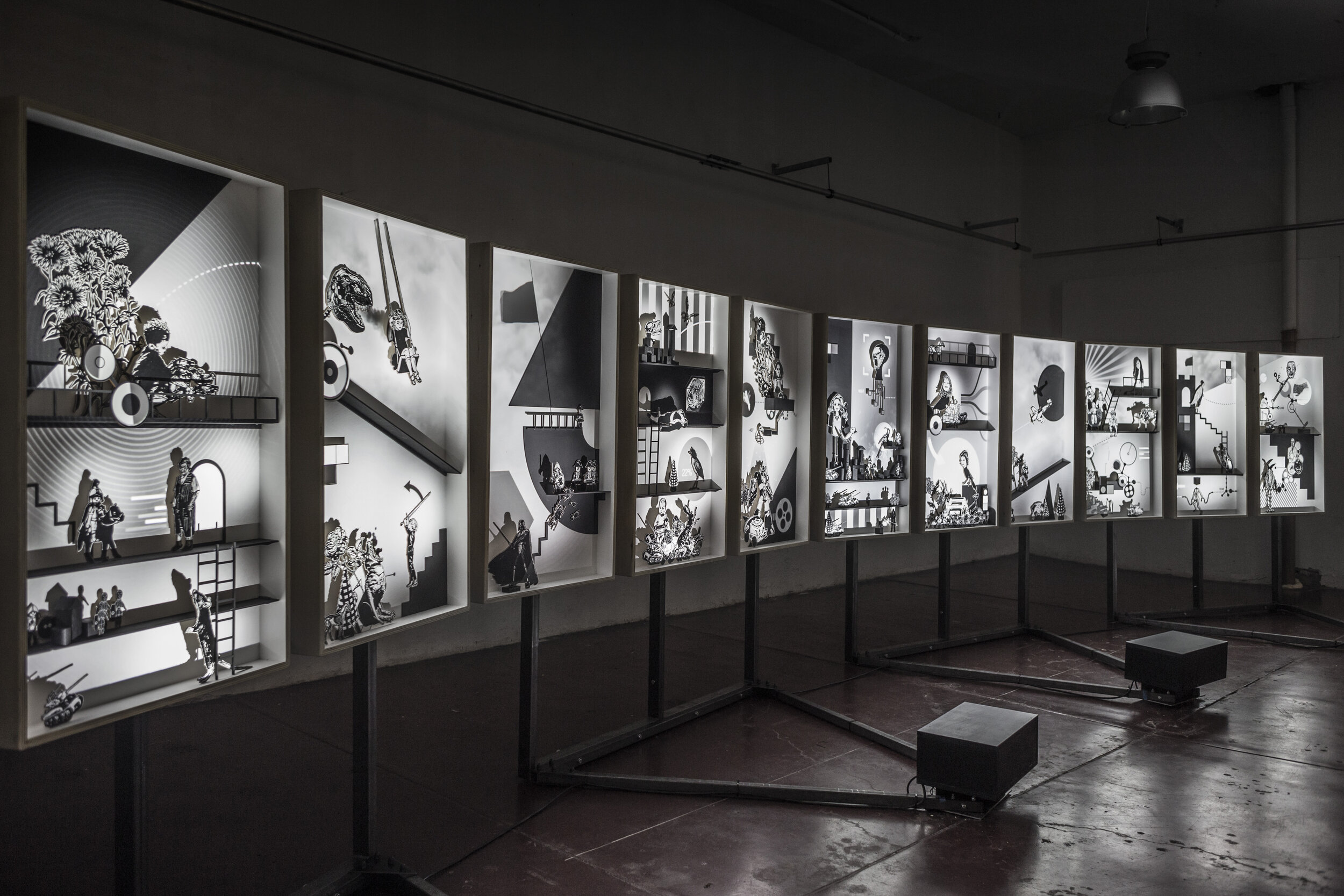 PLAY traveling exhibition by Fred Penelle and Yannick Jacquet, Modular installation composed of multiple framed scenes forming a continuous visual narrative