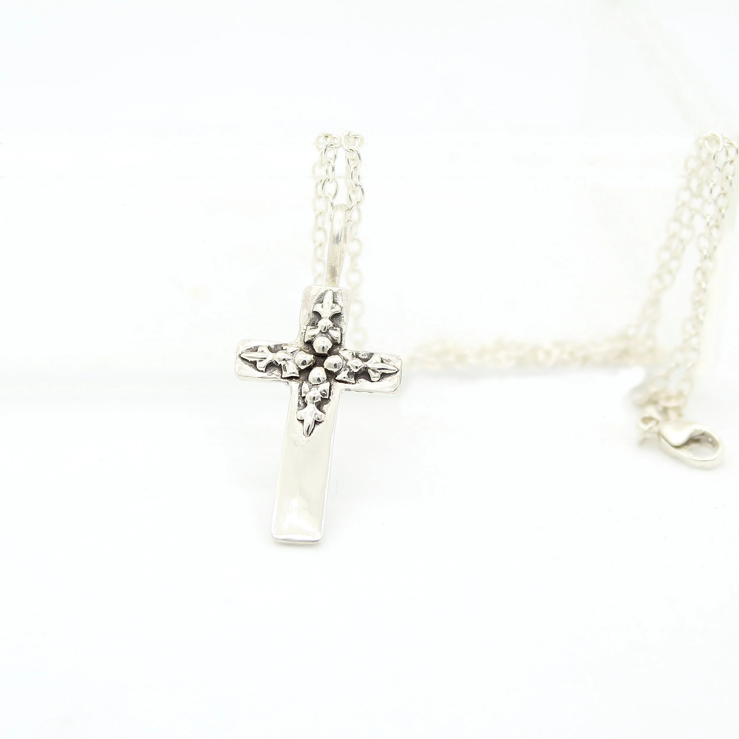 Sterling silver decorative cross necklace