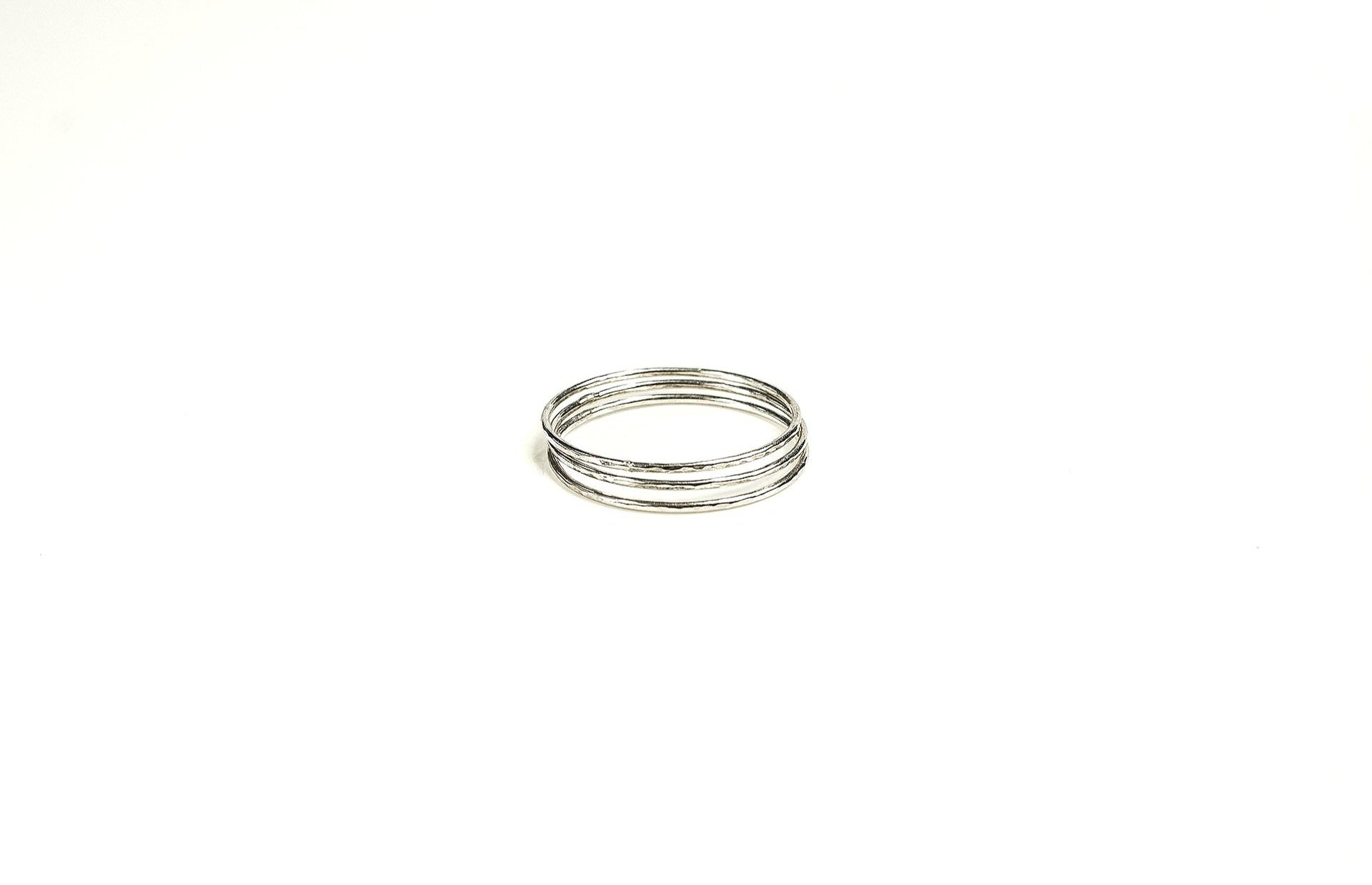 Handmade sterling silver ultra narrow rings.