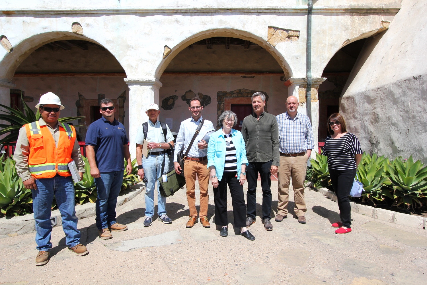  Project team members in front of the  convento  wing south elevation. &nbsp;From left: &nbsp;Napoleon Gallardo (Spectra), Troy Parry (Spectra), Nels Roselund (Roselund Engineering), Shane Swerdlow (Chattel), Tina Foss (Old Mission Santa Barbara), Jo