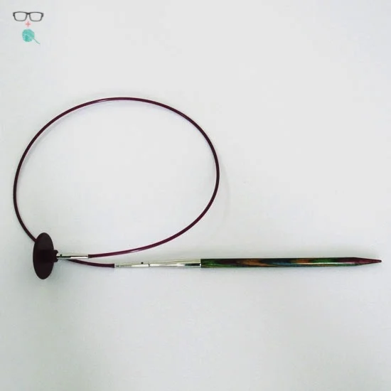 If you're already using your only size 8 interchangeable needle, no sweat - go down a needle size for this exercise. Also - this was really hard to photograph for some reason. This is the Knit Picks Harmony I think... it purple wooden needle in any case. 