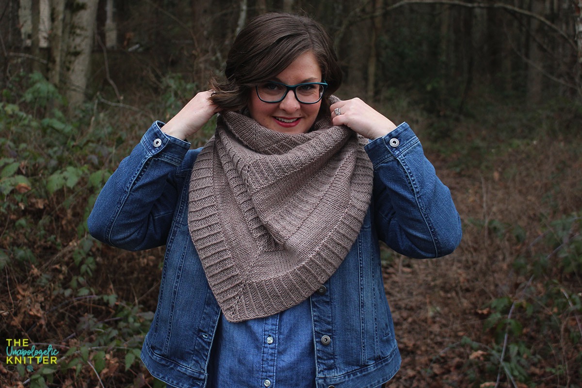 Hand knit shawls in 2 shapes and sizes featuring a repeating textural pattern.