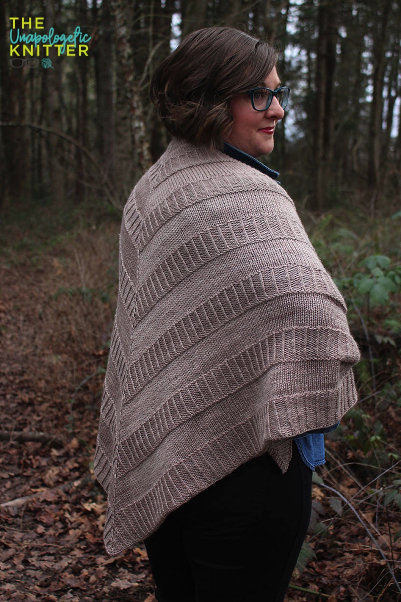 Hand knit shawls in 2 shapes and sizes featuring a repeating textural pattern.
