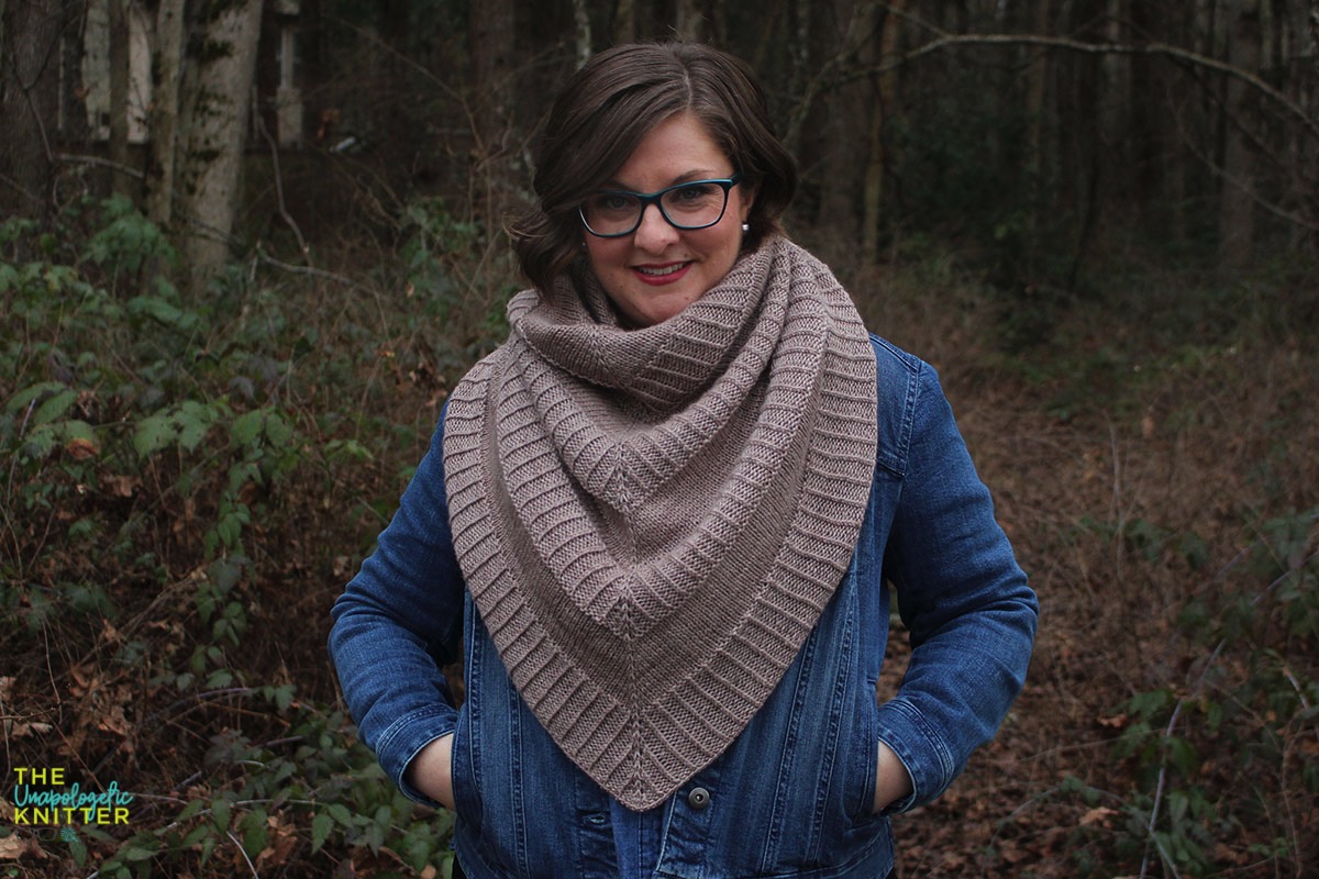 Hand knit shawls in 2 shapes and sizes featuring a repeating textural pattern.