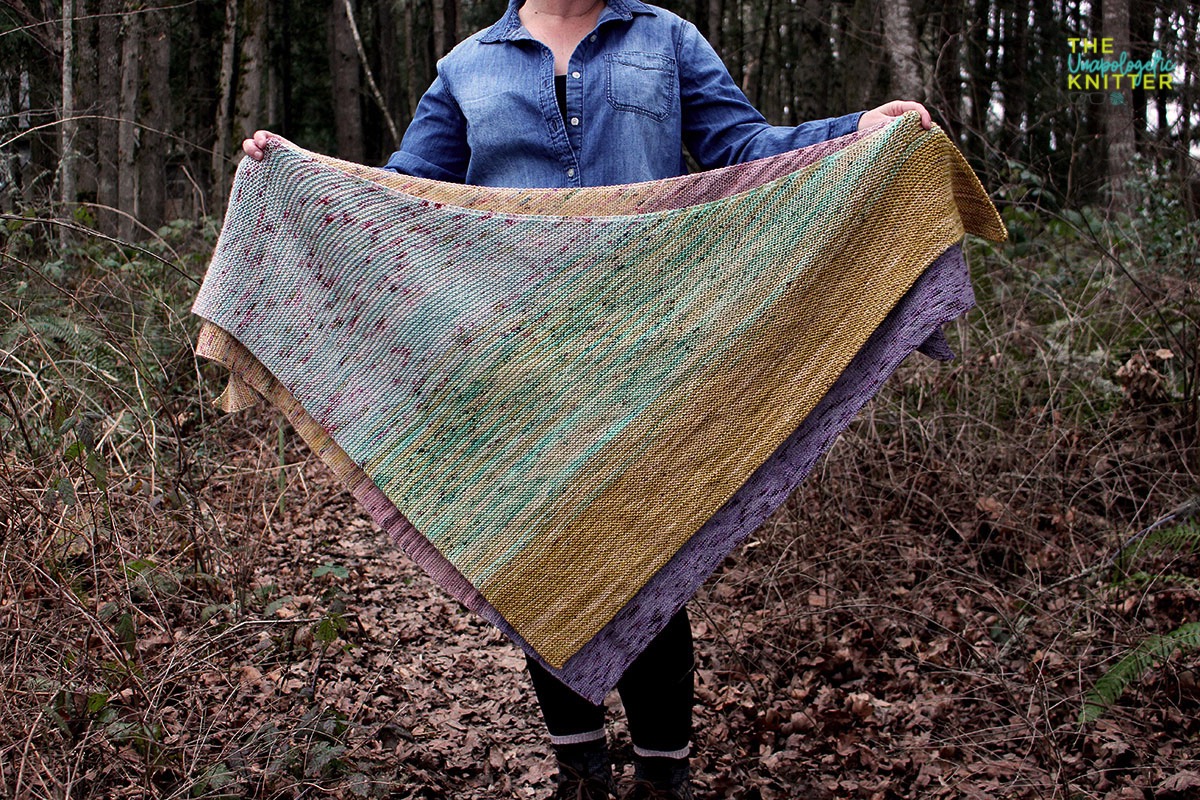 A 3-color garter triangular shawl with color shifting.