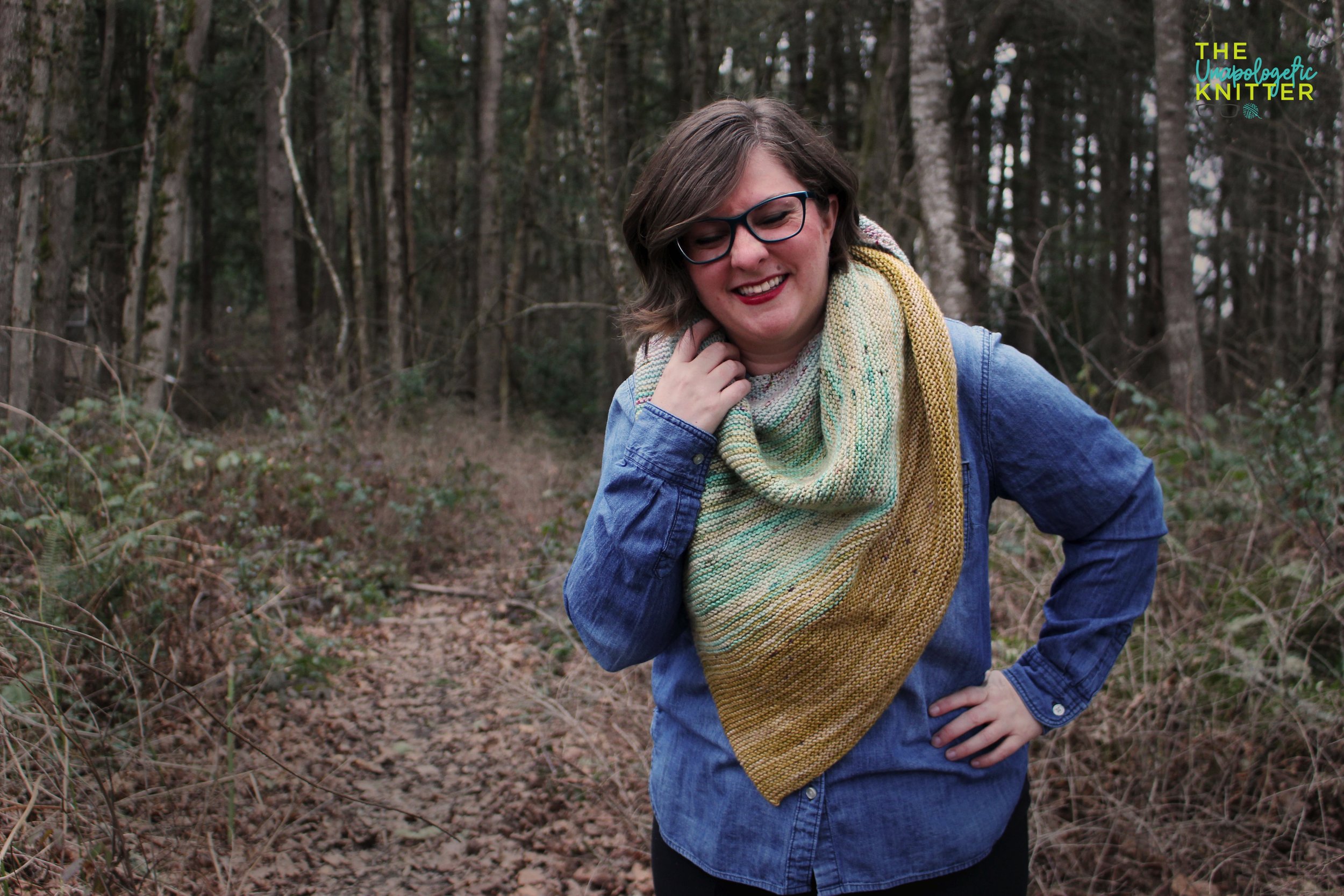 A 3-color garter triangular shawl with color shifting.