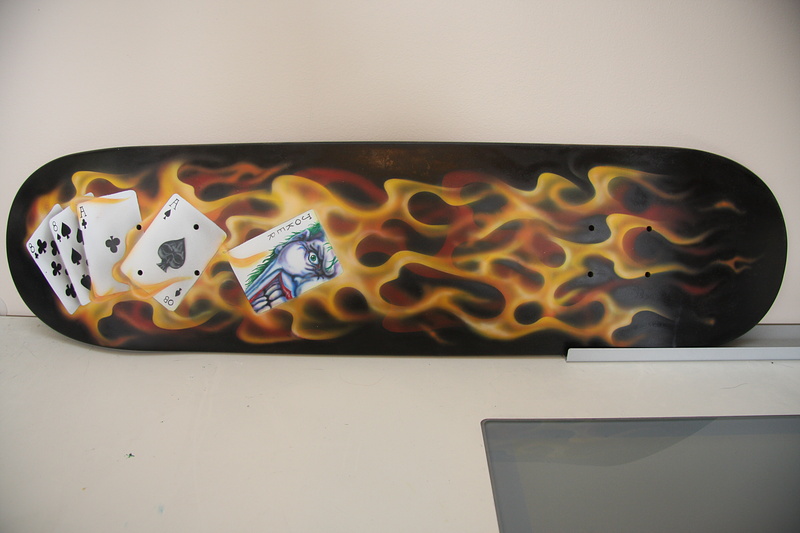 Fire and cards painted on a classic street shape