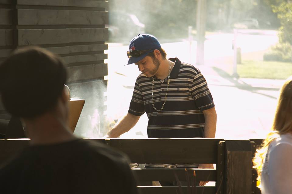 Jason, spending some hot time at the BBQ to feed the group! 